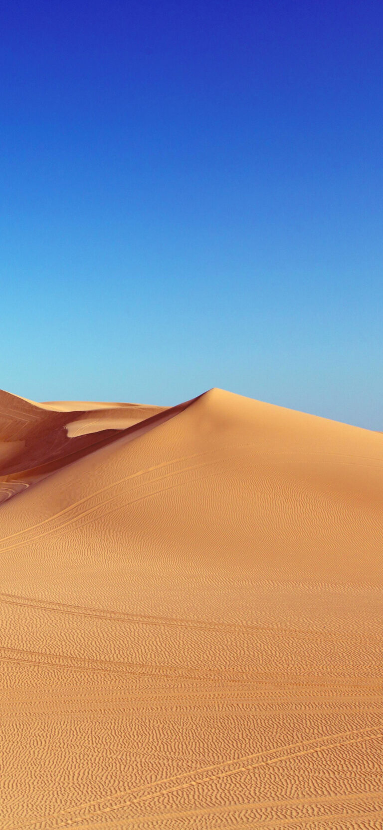 Default wallpaper of Dunes iOS 12 Concept