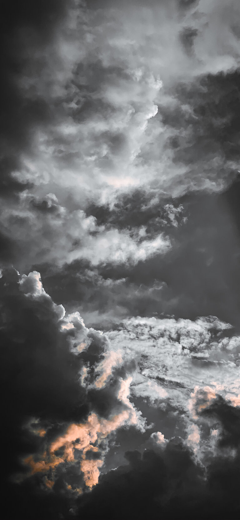 Default wallpaper of Clouds | Black N Orange