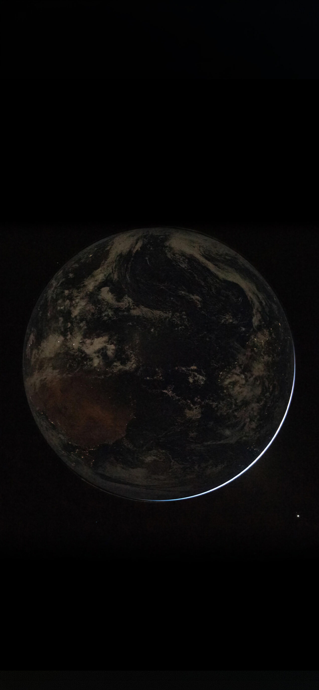 Artemis II – Backlit Earth