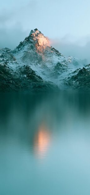 Golden Light on Frozen Peaks